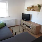 Schranz Apartment Grins